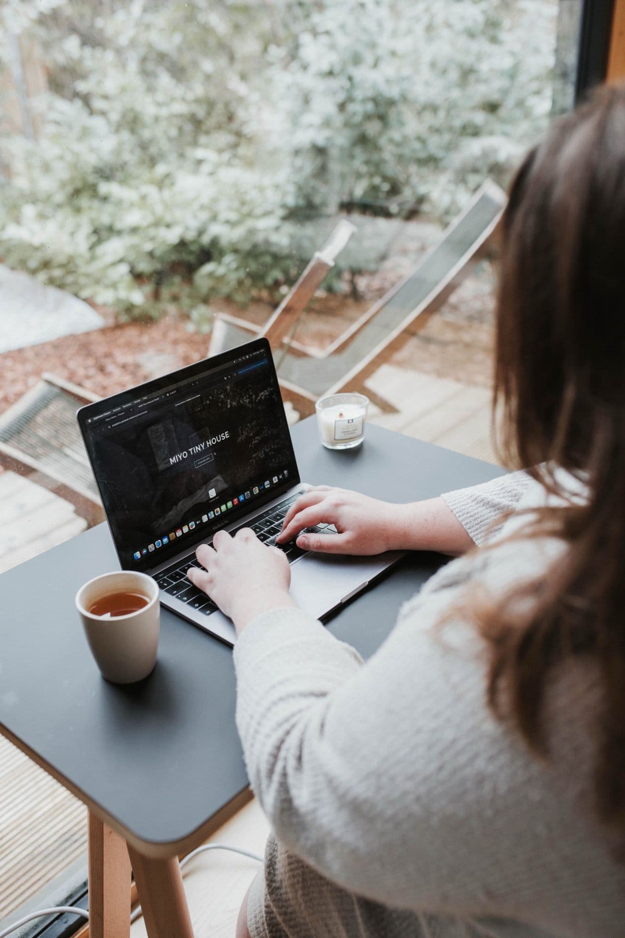 Dedicated workspace desk with ergonomic seating and power outlets
