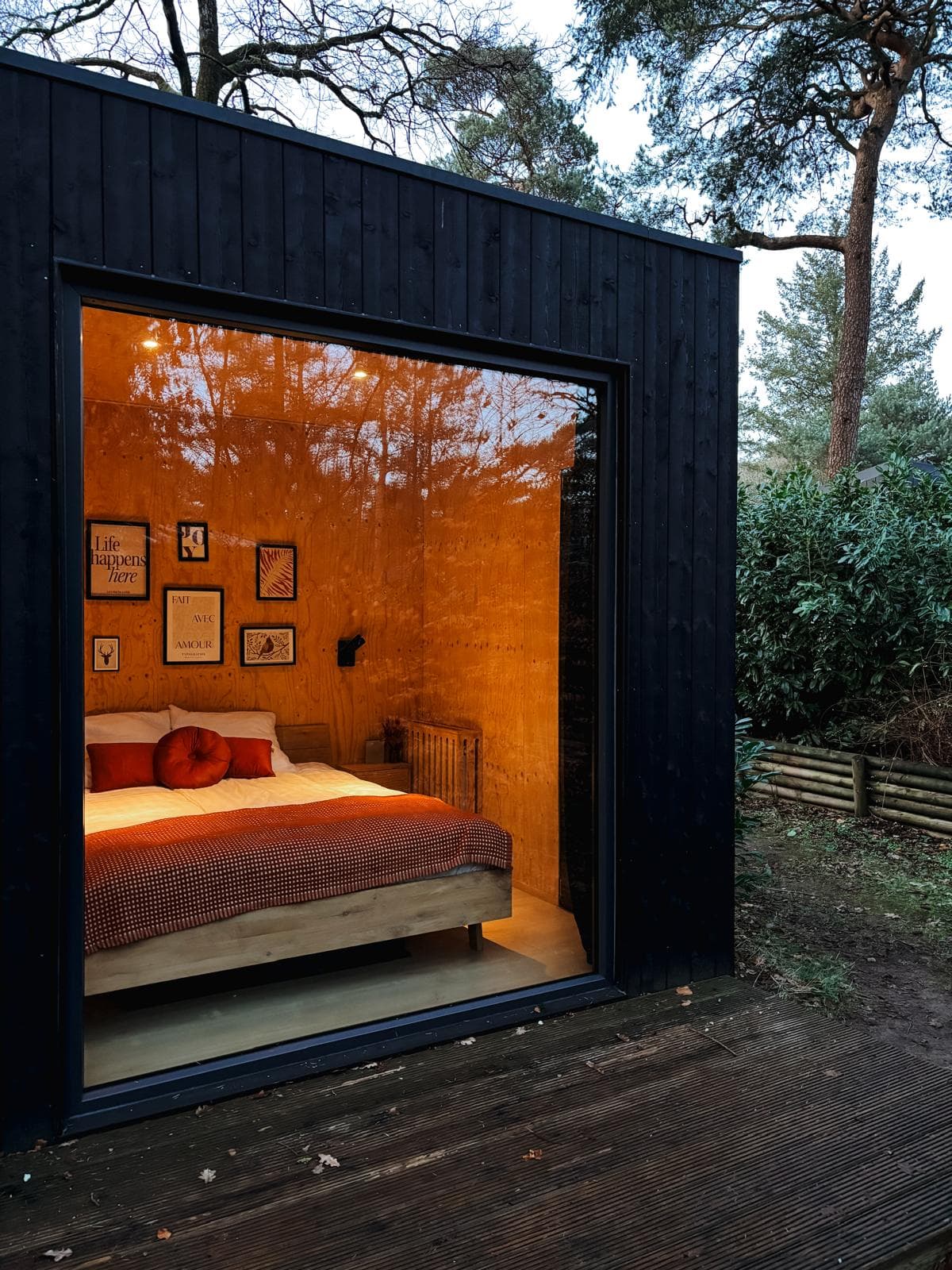 Master bedroom with forest view at Tiny House MIYO Veluwe